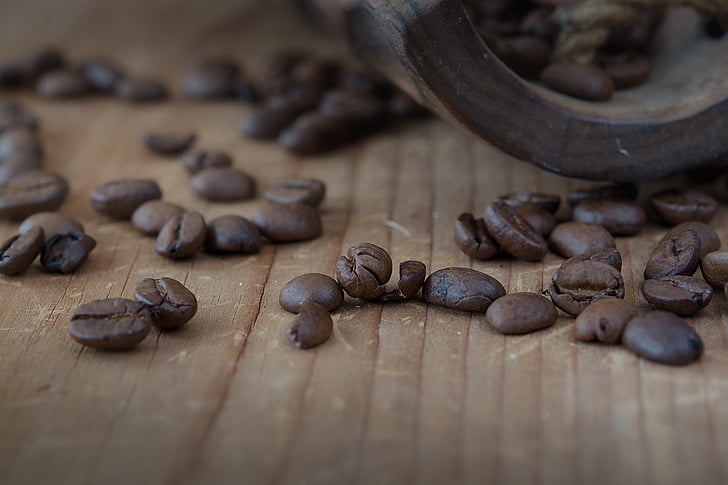 coffee beans on wood surface