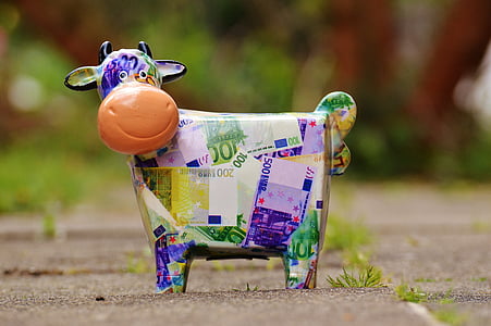 multicolored banknote cow figure