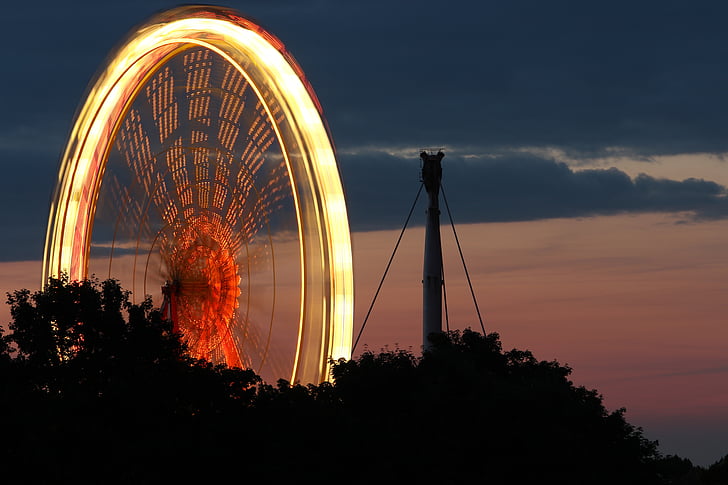 time lapse photography of Ferris wheel at night