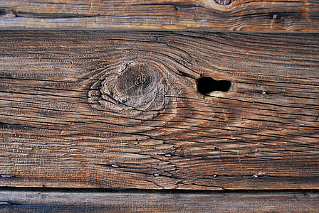 brown wooden plank with hole