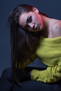 woman wearing yellow off-shoulder sweater