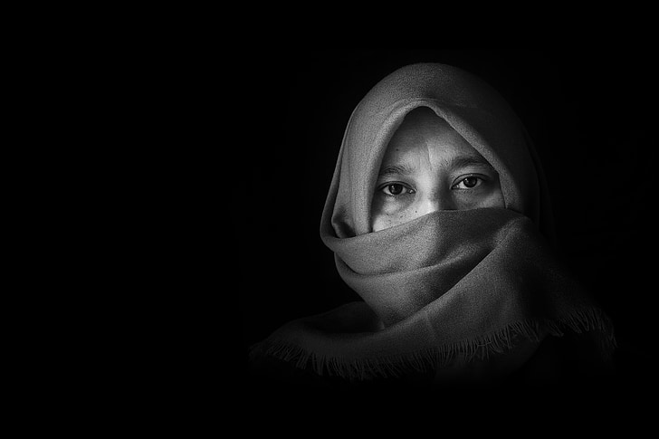 grayscale photograph of woman wearing hijab headscarf