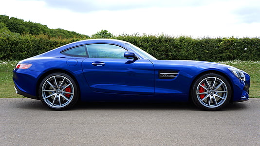 blue Mercedes-Benz AMG GT coupe parked during daytime
