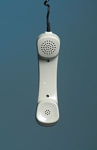 white corded telephone