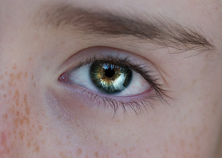 person showing green iris