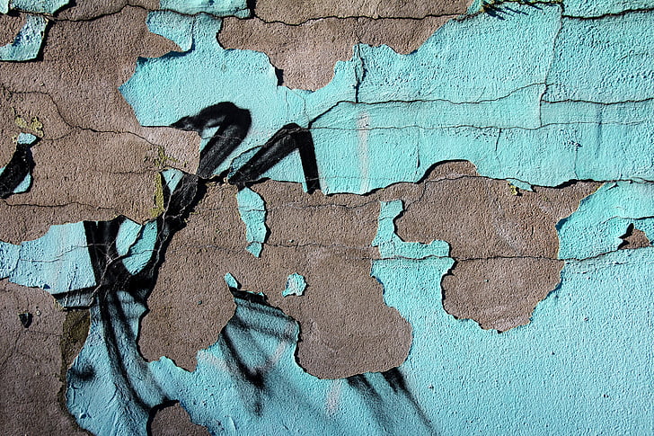 cyan painted brown wall