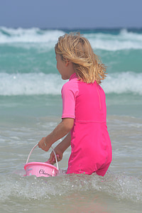 girl playing on beach
