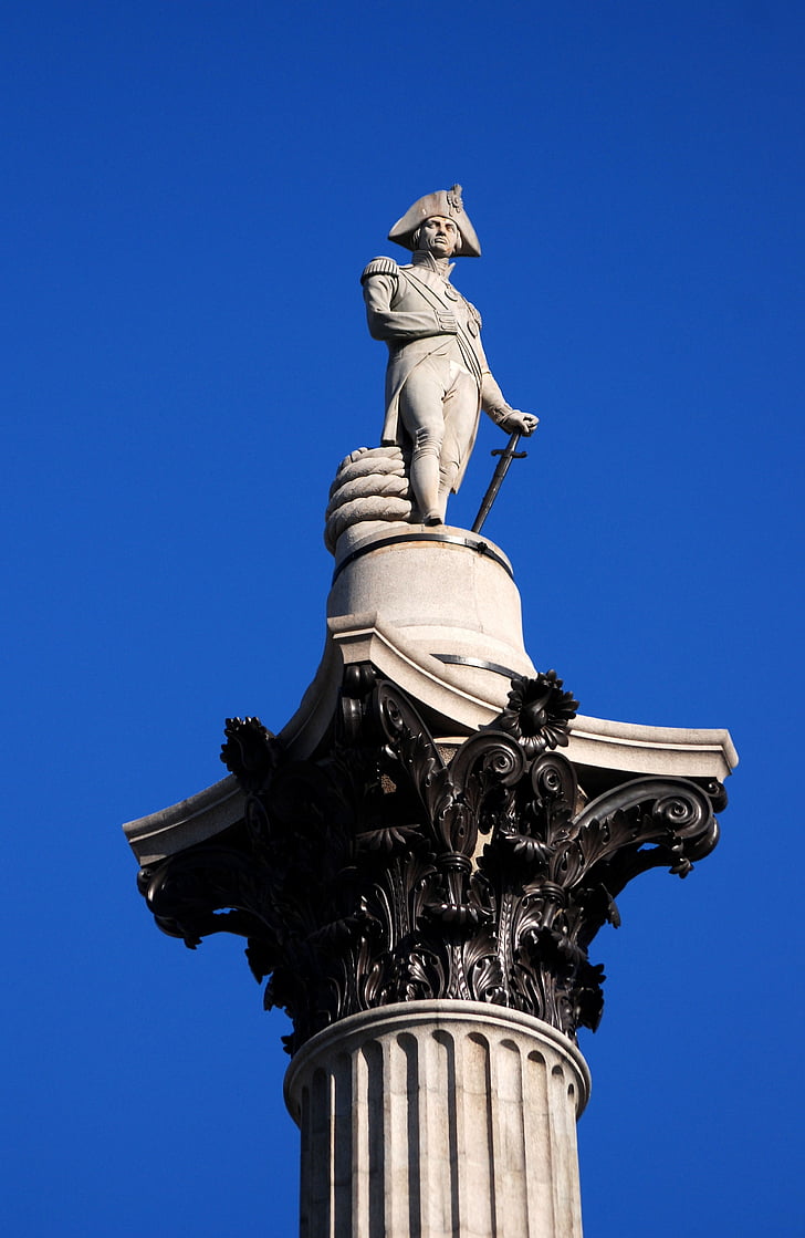 man statue under blue sky during daytime