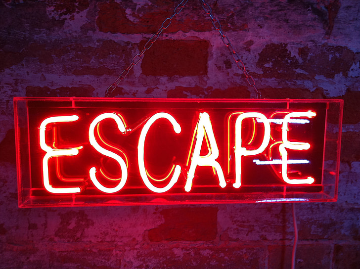 red escape neon light signage