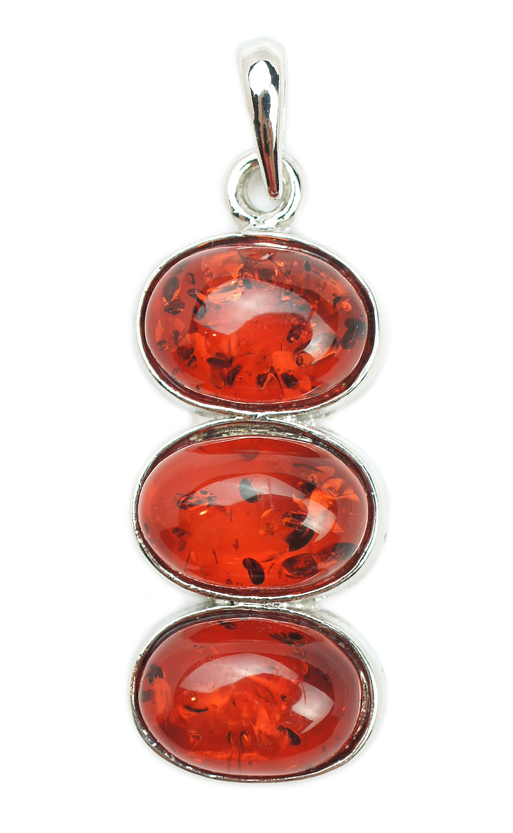 silver-colored three red gemstone pendant