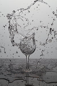 wine glass filled with water explode