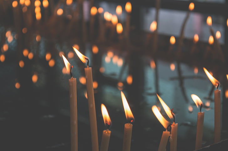 selective focus photo of lit candles
