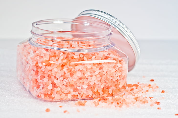 pink stones in glass jar