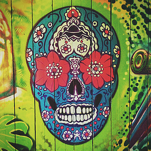 blue, red, and white Calavera skull painting