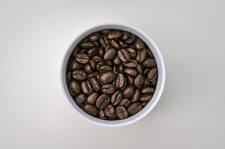coffee bean and white ceramic bowl