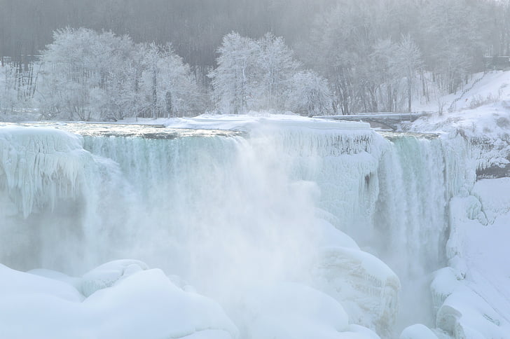 landscape photography of frosted waterfalls