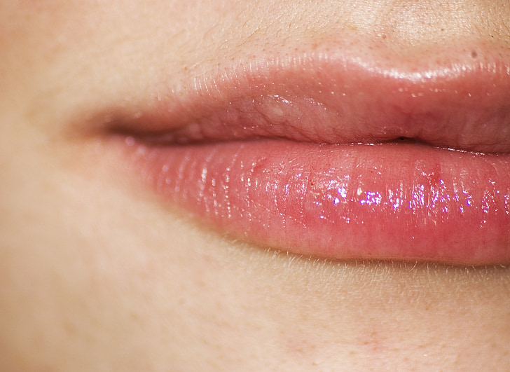 close up photo of person's lips