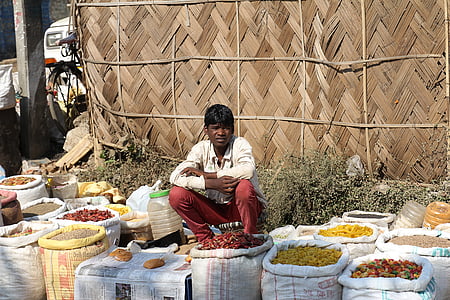 man selling spices