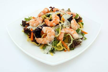 vegetable with shrimp serving on white ceramic plate