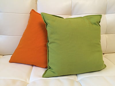 green and orange throw pillows