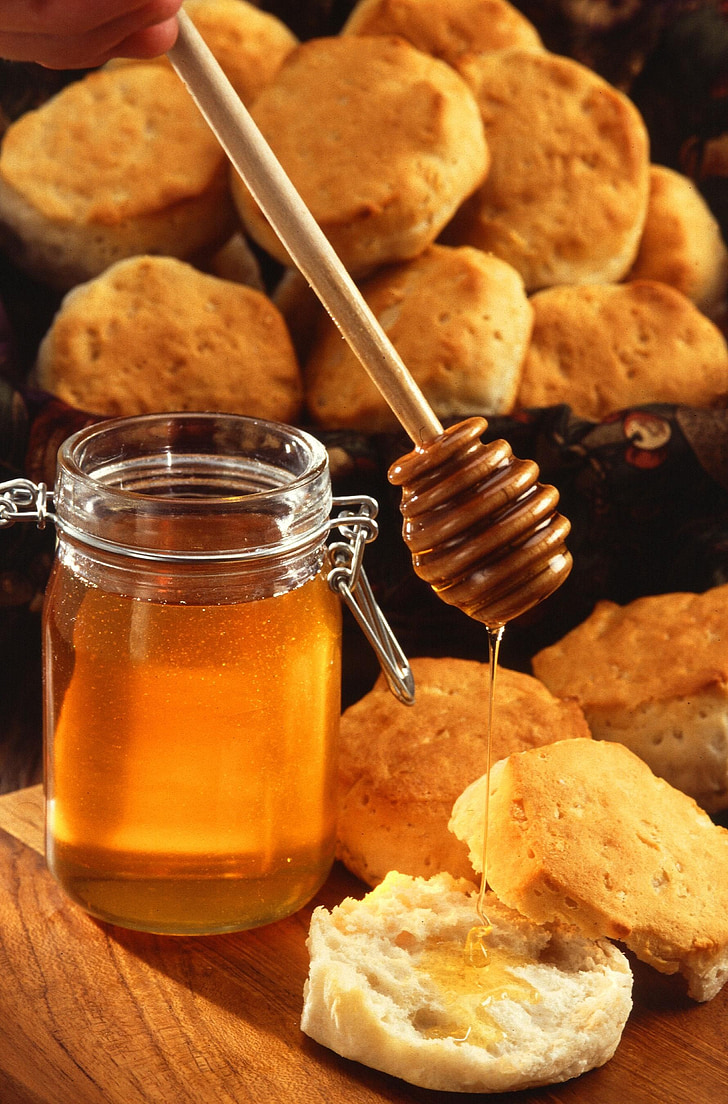 bread beside honey jar