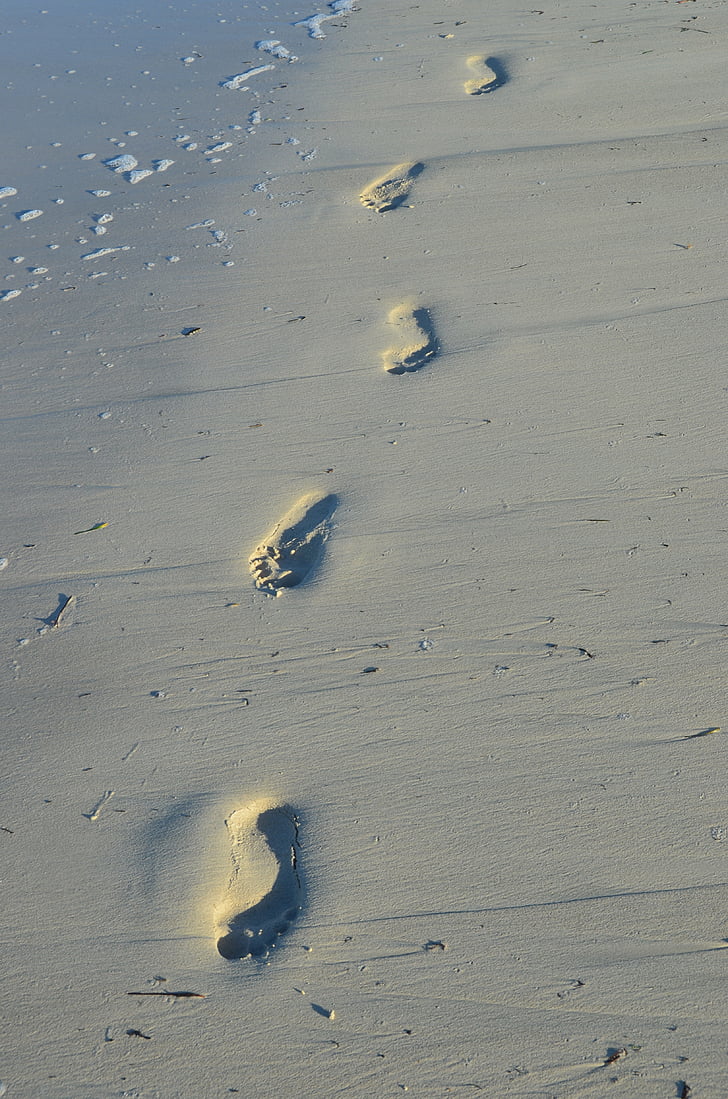 foot steps at seashore