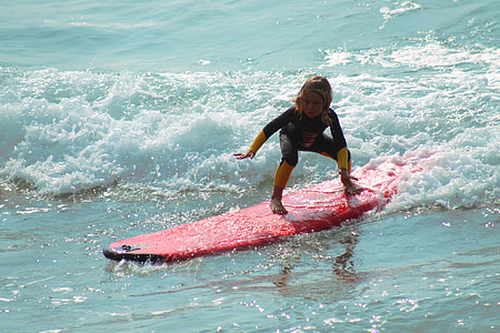 girl riding a surfboard