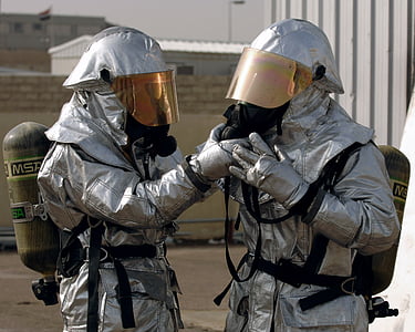 two person wearing hazard suits