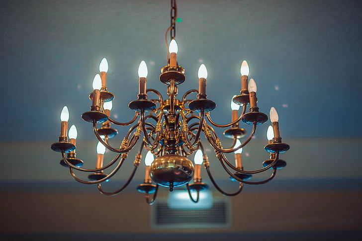 shallow focus photography of brown uplight chandelier