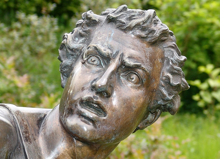 bronze sculpture of man