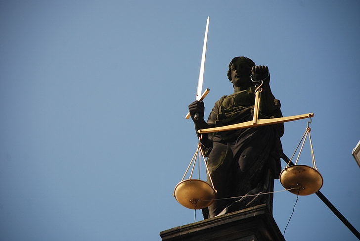 closeup photo of Lady Justice statue