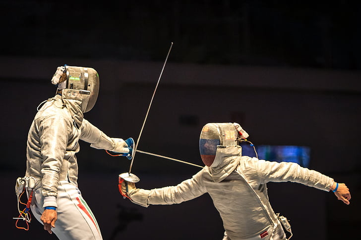 two person doing fencing sport