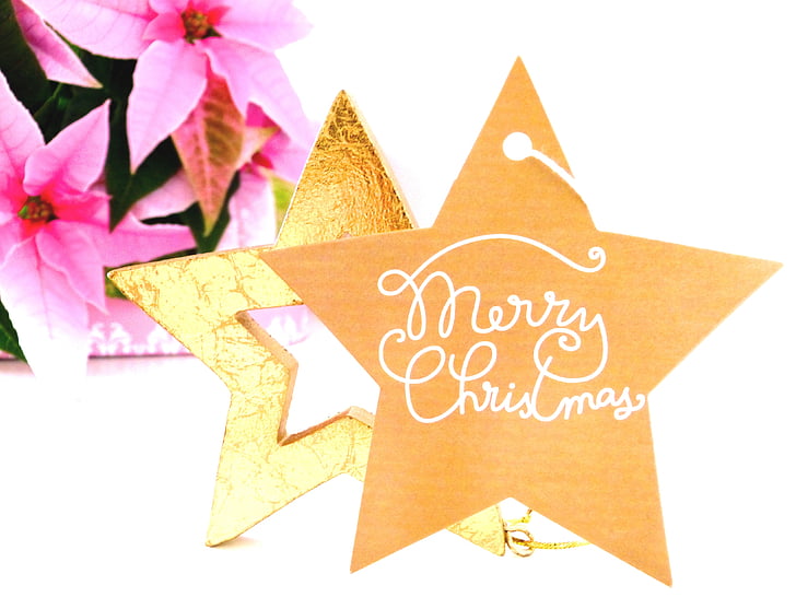 brown and white star table decor with merry Christmas text