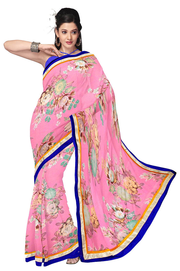 woman standing wearing pink floral sari dress