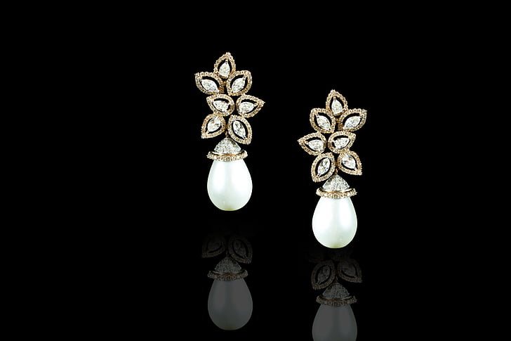 pair of white earrings