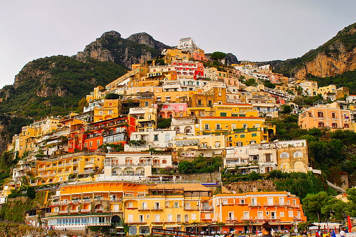assorted-color houses on top of mountain at daytime