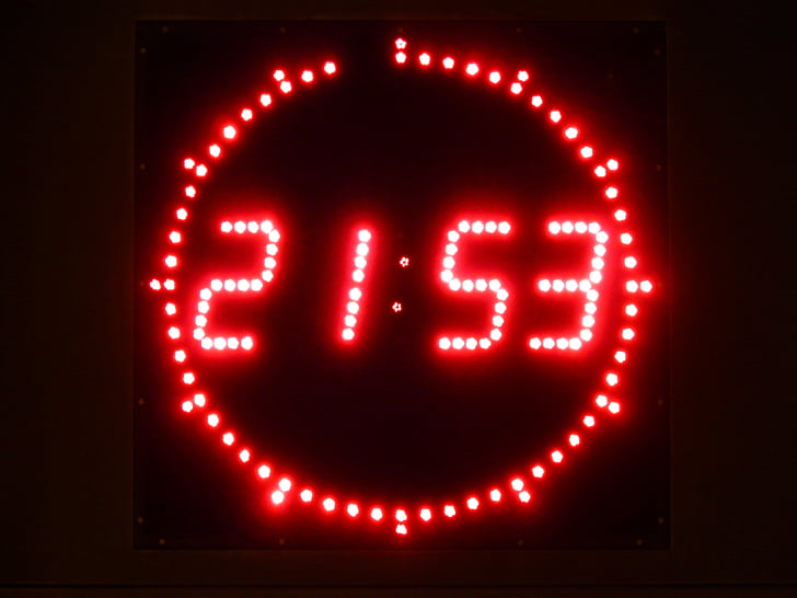red LED alarm clock at 21:53