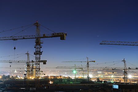 cranes at night time