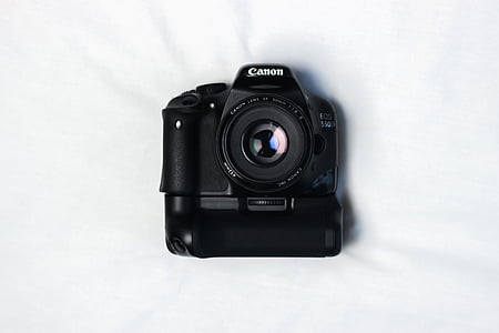 black Canon EOS DSLR camera
