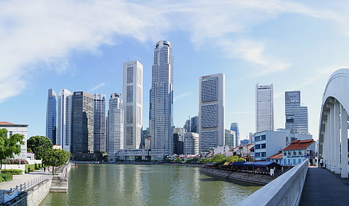 body of water surrounded by concrete buildings