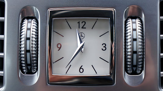 square white Mercedes-Benz analog watch displaying 11:36 time