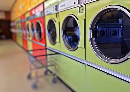 selective focus photography of inline washing machines