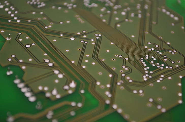 closeup photo of green circuit board