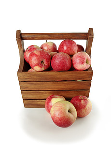 red apples in brown basket