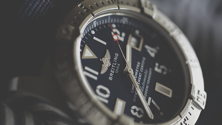 Breitling analog watch at 2:35 display