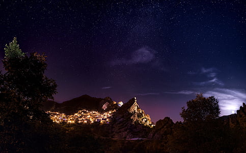 photo of mountain during night time