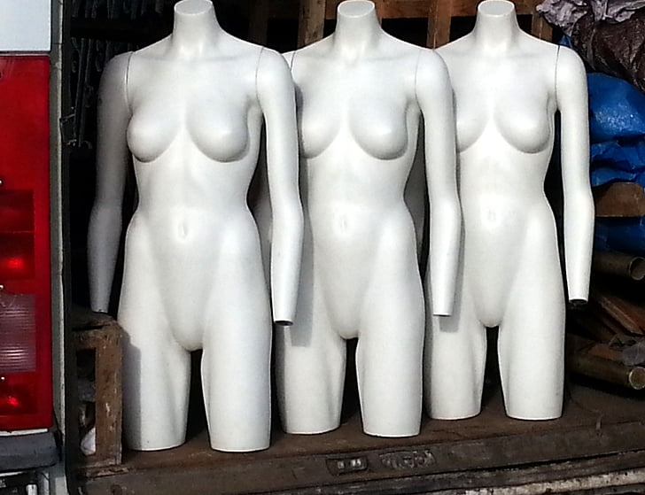three white mannequins