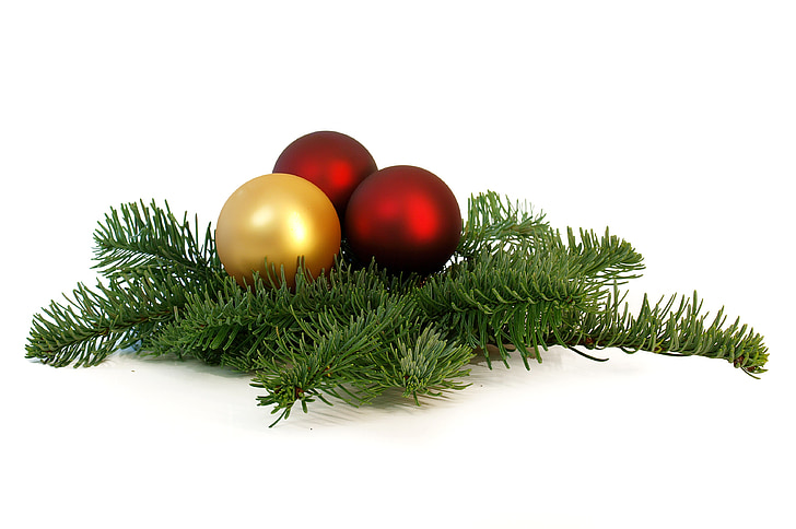 three red and gold Christmas baubles
