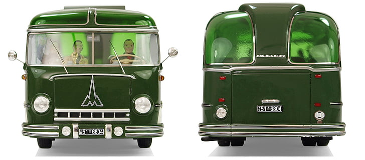 two men inside green van