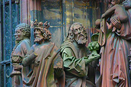four man statues